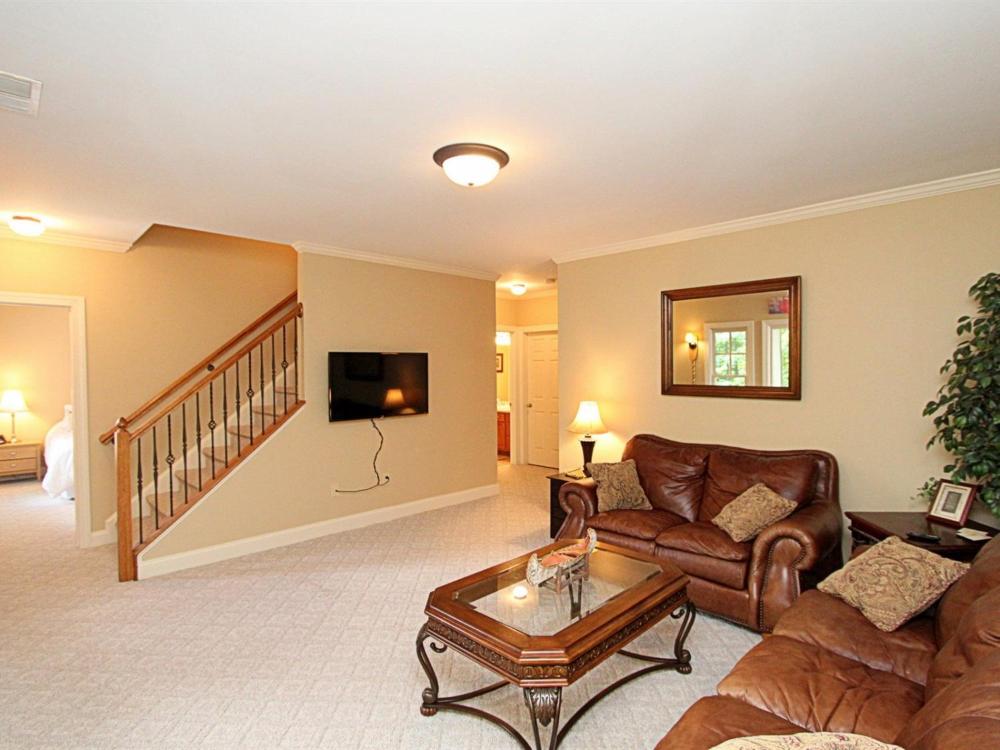 Tippy Canoe Lodge - Relax by the fireplace or play ping pong and foosball
